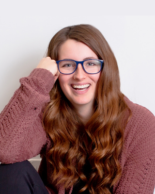 Portrait of Caitlyn Schafers, Associate
